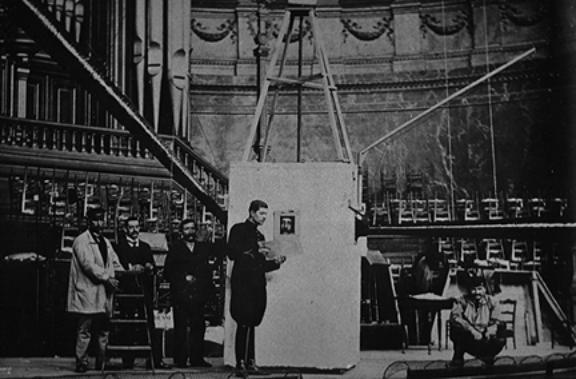 Gustave Lyon and an assistant analyzing the location of echoes 